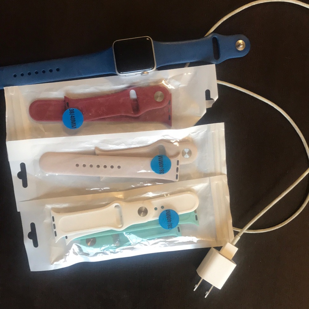 Apple Watch 3 with 4 additional bands and charger